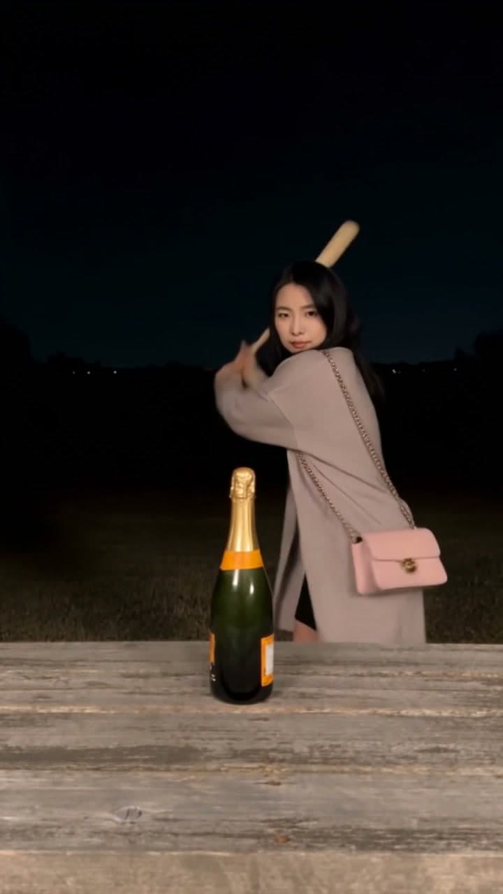 AI-generated champagne bat-smash scene with one person, a wooden table and a champagne bottle.