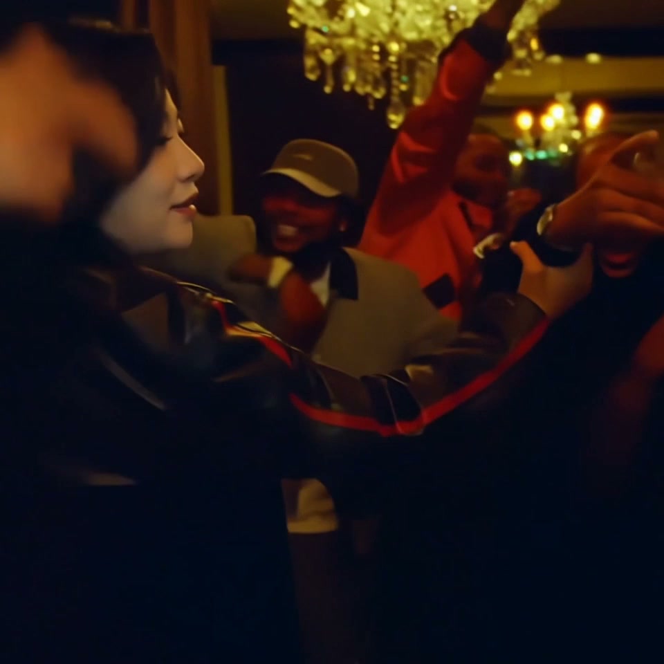A generated lead performer holding a silver cup in a wood-paneled party room with guests behind.