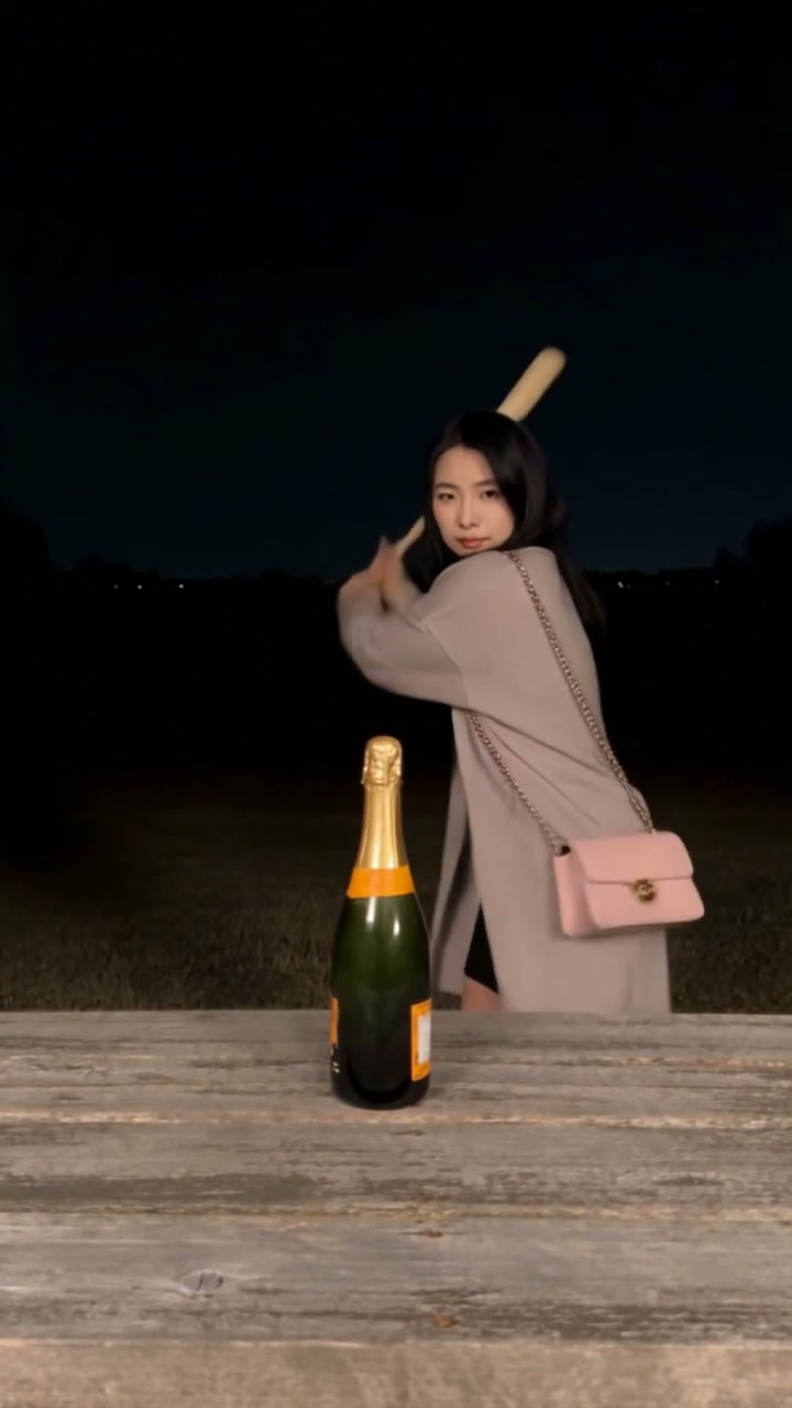 AI-generated champagne bat-smash scene with one person, a wooden table and a champagne bottle.